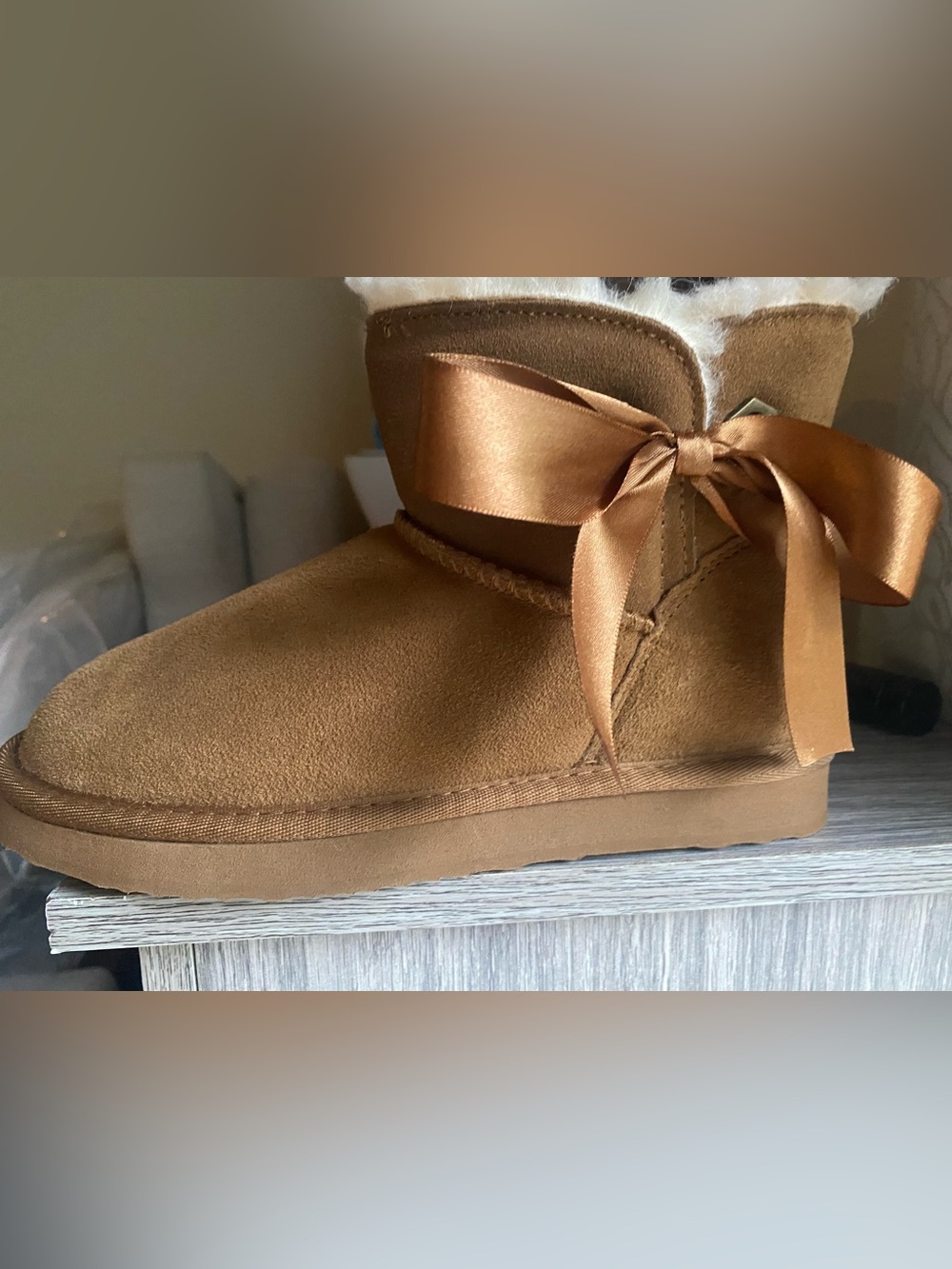 BEARPAW SUEDE SHEARLING LINED BOOTS